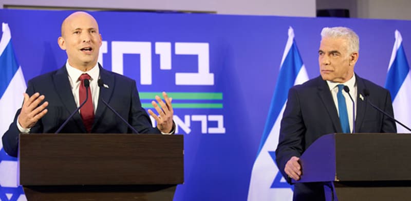 "לפיד ובנט בעת ההצהרה על האיחוד / צילום: ap, Ariel Schalit"