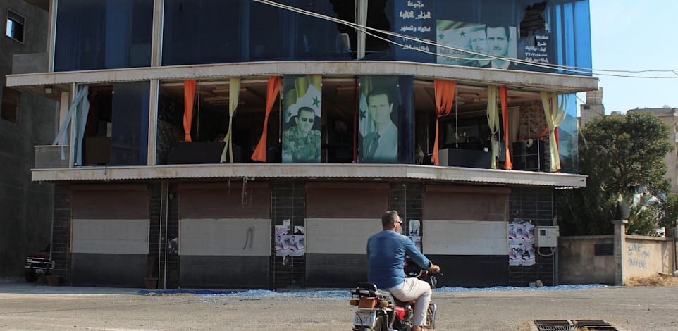 בניין שניזוק בתקיפה במסיאף, סוריה / צילום: Reuters, Firas Makdesi