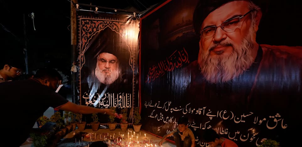 מוסלמים שיעים מתאבלים על חסן נסראללה, פקיסטן / צילום: ap, Fareed Khan