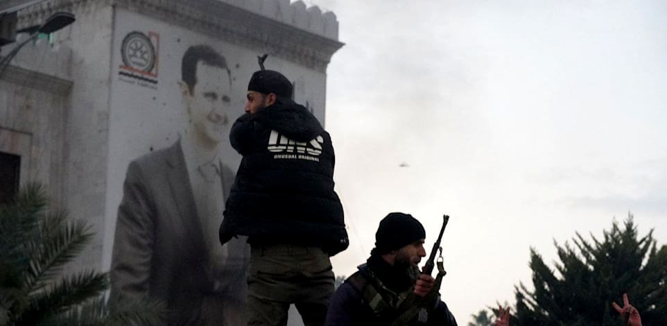 המורדים השתלטו על העיר חמאה בסוריה / צילום: Reuters, Ammar Hatib