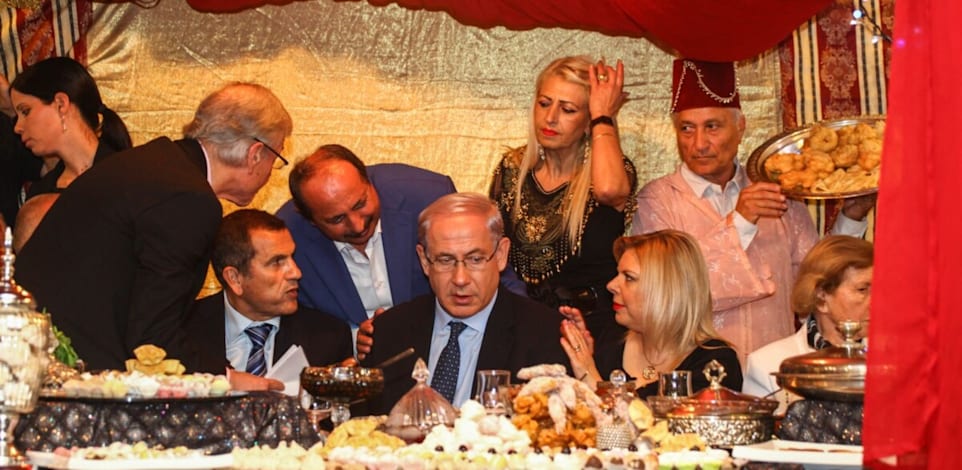 בני הזוג נתניהו בחגיגות המימונה, 2014 / צילום: אבישג שאר-ישוב