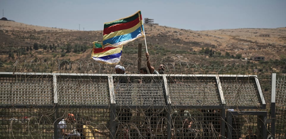 דרוזים סורים מפגינים סמוך לגבול ישראל-סוריה / צילום: ap, Leo Correa