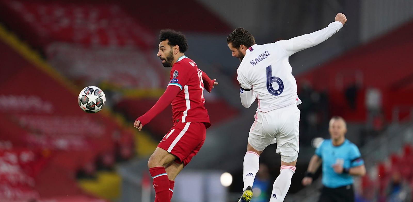 מוחמד סלאח ומאצ'ו במשחק בין ליברפול וריאל מדריד / צילום: Associated Press, Jon Super