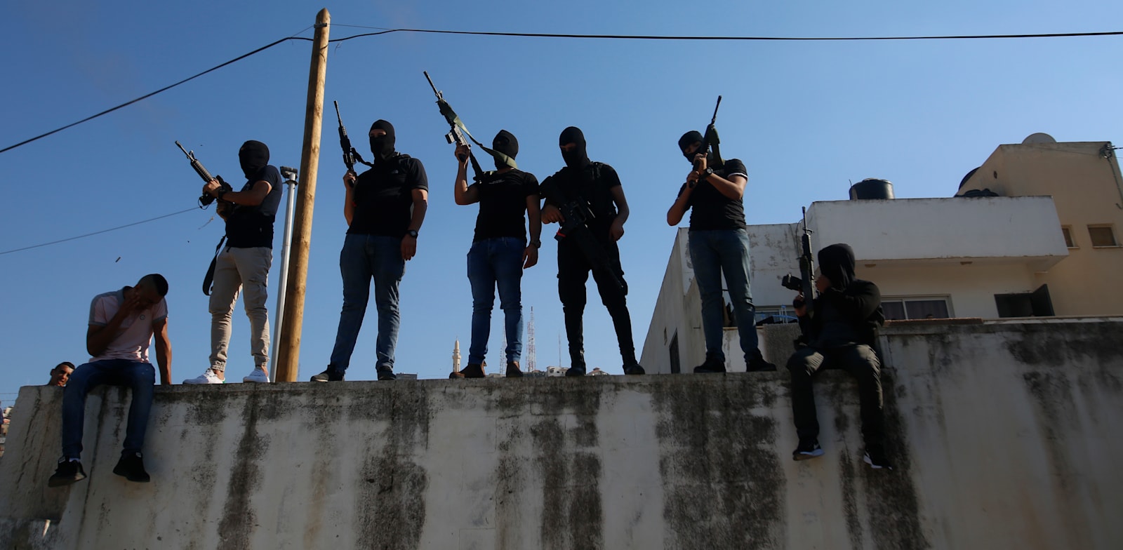חמושים פלסטינים ברחובות ג'נין / צילום: Associated Press, Majdi Mohammed