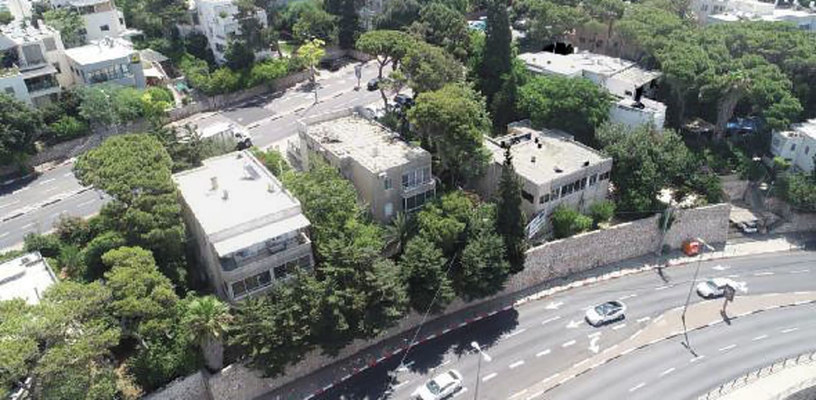 קרקע ומבנה מגורים של החברה ברחוב חורב בחיפה / צילום: מצגת החברה