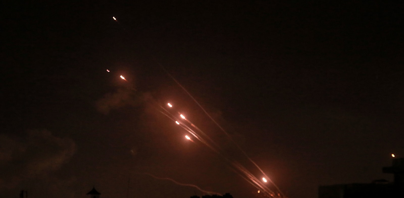רקטות נורות מעזה לישראל / צילום: Reuters, Mohammed Talatene/dpa