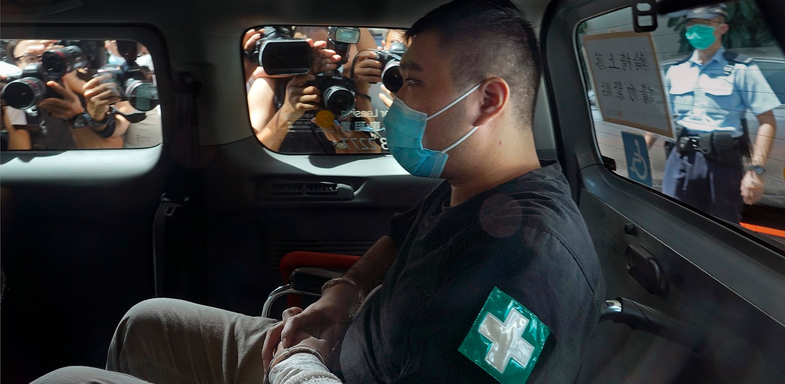 טונג יינג-קיט לפני דיון בעניינו בשנה שעברה / צילום: Associated Press, Vincent Yu