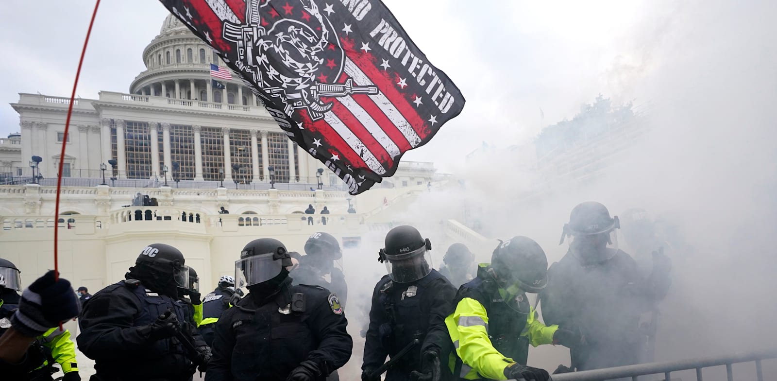 ההסתערות על הקפיטול בתחילת השנה. ארצות הברית היא אחת המדינות שהכי מועדות לסיכון, לפי פייסבוק / צילום: Associated Press, Julio Cortez