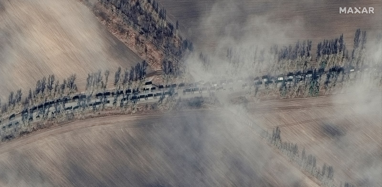 צילומי לווין שמראים את הכוחות הרוסיים מתקדמים לכיוון קייב, ב-27 בפברואר. מעשי התוקפנות של פוטין מאיימים לגרור את העולם 70 שנים אחורנית / צילום: Reuters, Maxar Technologies/Handout