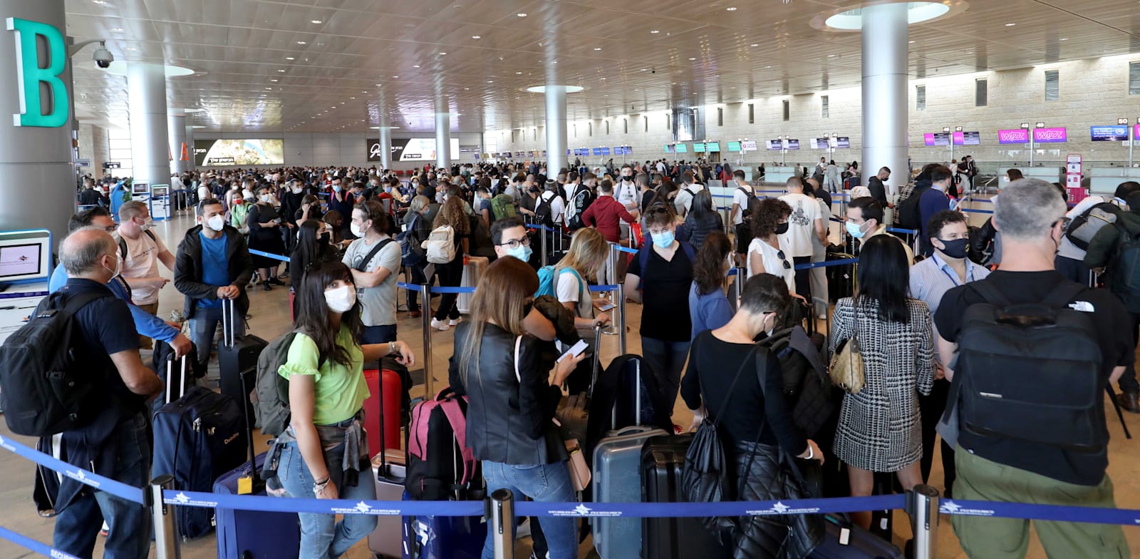 עומסים כבדים בבדיקות הביטחוניות בנתב''ג / צילום: Shutterstock