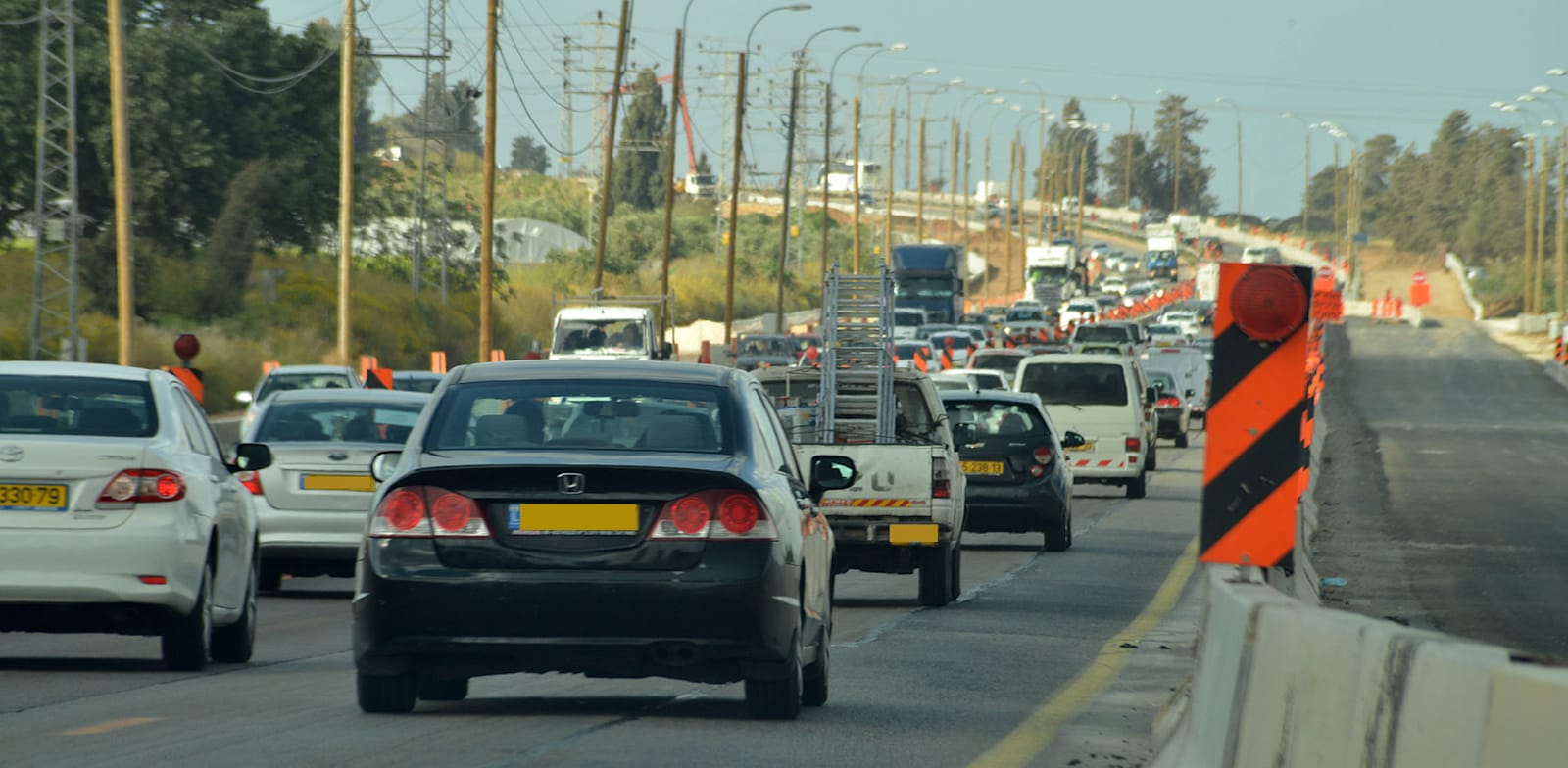 התובע סיכן את חייו כדי להציל את הפעוט בכביש סואן / צילום: תמר מצפי