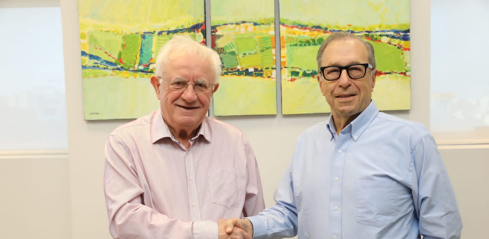 מימין: רן גוטפריד, יו''ר דירקטוריון שופרסל ודן אסטרוג מייסד דן דיל / צילום: חן גלילי - יח''צ