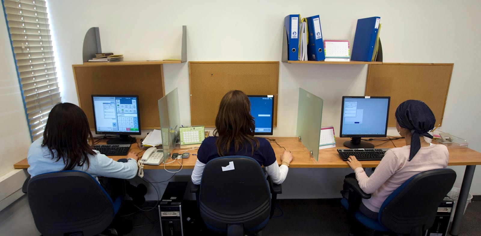 Haredi women at a high-tech company  credit: Darren Whiteside, Reuters