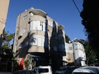 רחוב מסדה בשכונת הדר בחיפה. התושבים הצעירים הקימו רשת חברתית אנושית / צילום: איל יצהר