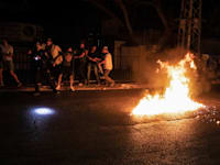 מתוך המהומות בלוד, אמש / צילום: Reuters, Oren Ziv/dpa