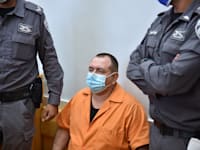 רומן זדורוב בדיון בבית המשפט / צילום: גיל אליהו