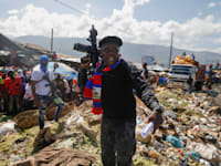 מנהיג קואליציית G9, ג'ימי שריזייה, בפורט־או־פרנס, בחודש שעבר / צילום: Associated Press, Joseph Odely