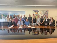 מעמד החתימה על ההסכם הקיבוצי בכלל ביטוח / צילום: יח''צ