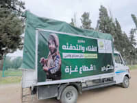 משאית חלוקת חומרי הסקה של עמותת ''סיוע 48'' / צילום: מתוך יוטיוב