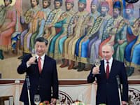 נשיא רוסיה ולדימיר פוטין, ונשיא סין שי ג'ינפינג משתתפים בקבלת הפנים בקרמלין / צילום: Reuters