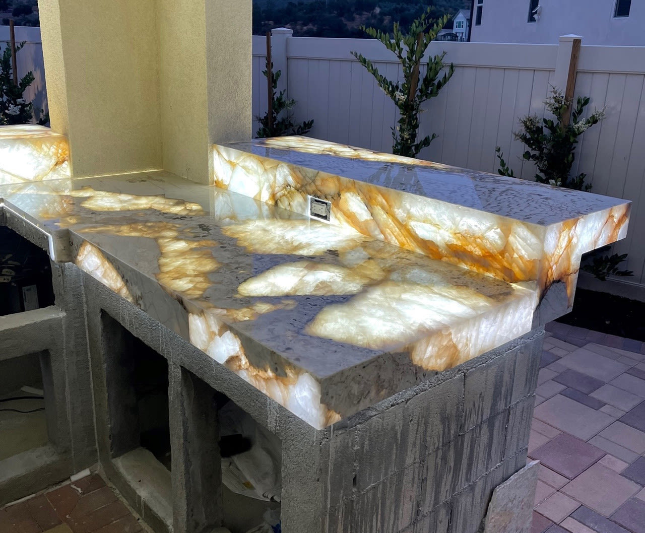 Backlit stone patio bar made of quartzite