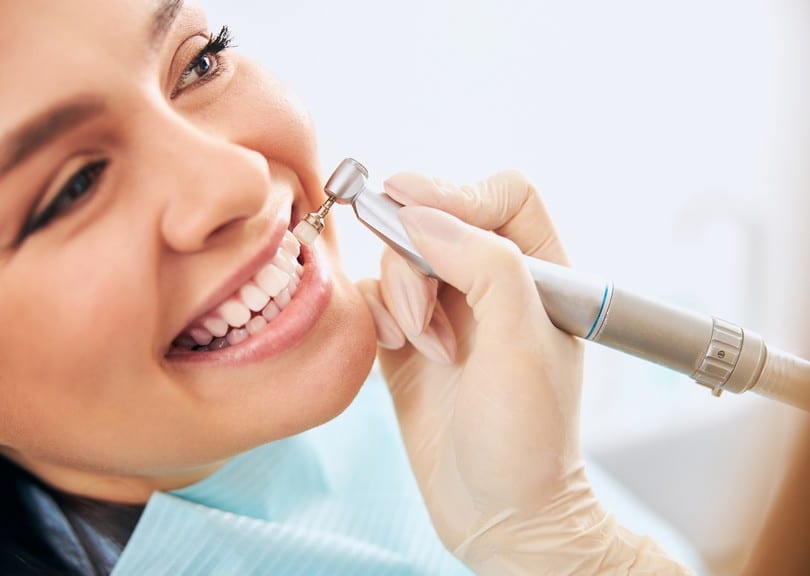 Teeth cleaning and polishing and whiting session