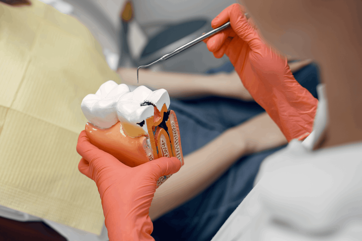 Non-surgical tooth extraction (not including wisdom teeth) with periapical X-ray and full dental examination