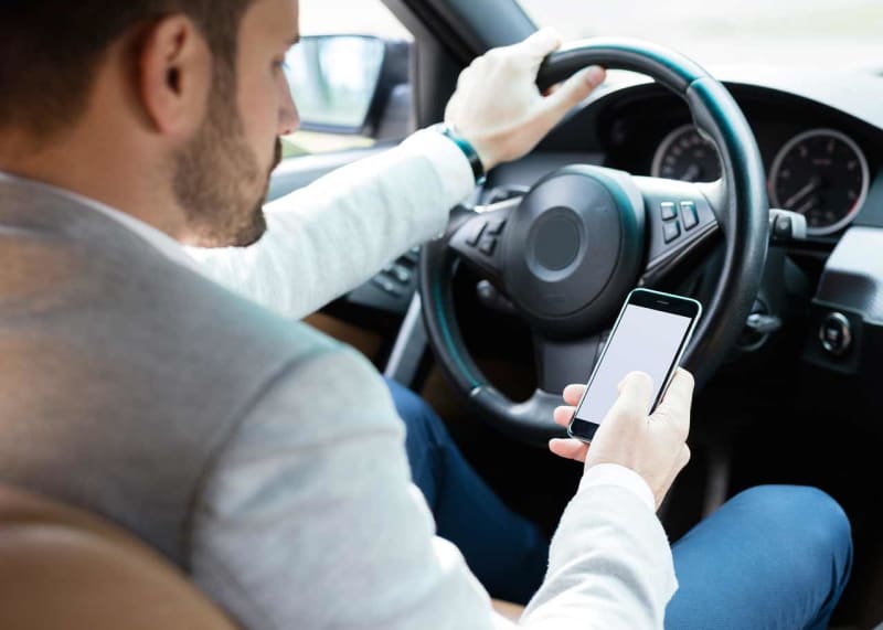 Is Texting While Driving Illegal in Illinois?