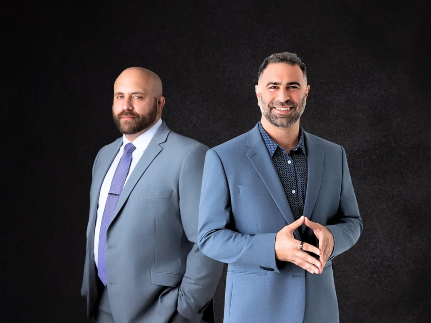 Adam Touma and Jarrett Roman, attorneys at Touma Law Group