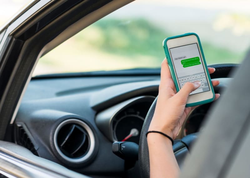 is it illegal to smoke cigarettes while driving in illinois Distracted Driving In Illinois