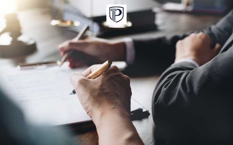 a Kane CDL Reinstatement Attorney looking over forms for a case