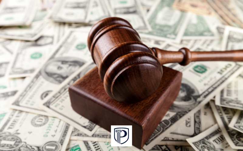 a gavel on a pile of money