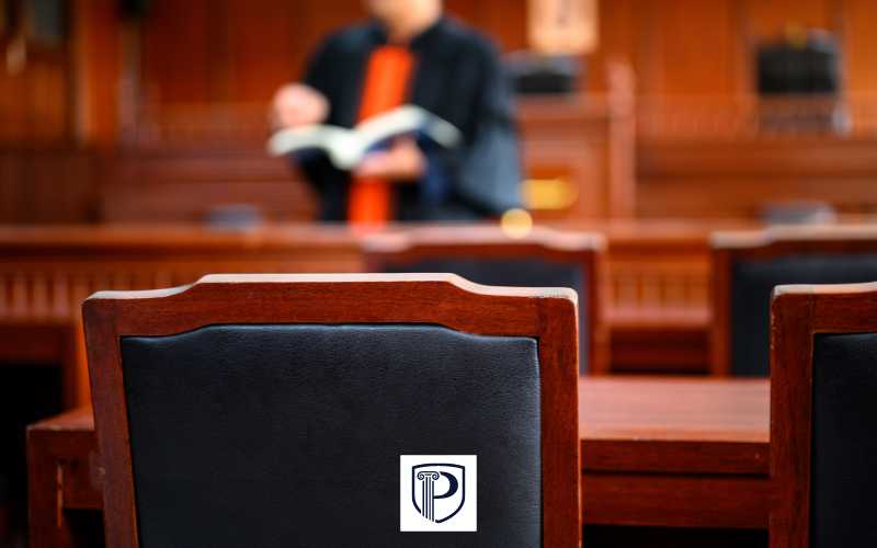 a photo of a hearing in a court room