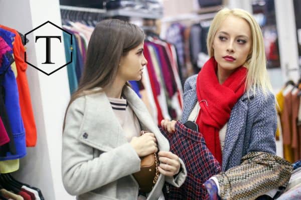 two girls shoplifting in a retail store