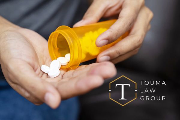 a person taking Adderall out of a bottle that isn't labeled
