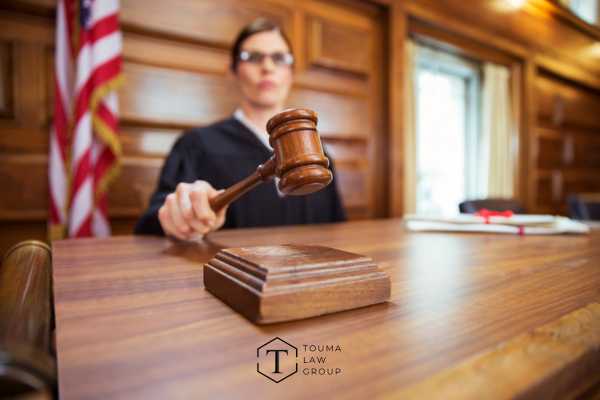 a judge at their stand in court