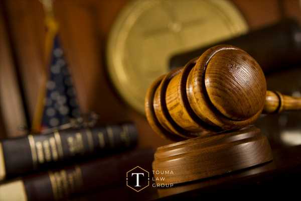 a gavel and legal books on a judge's desk