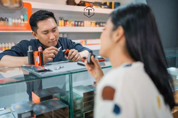 a woman buying delta 8 products in a smoke shop