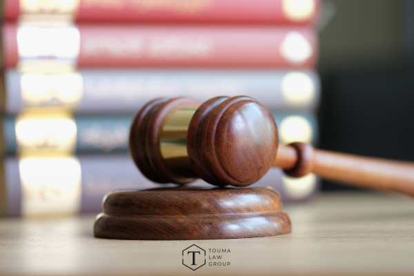 legal books and a gavel on a desk