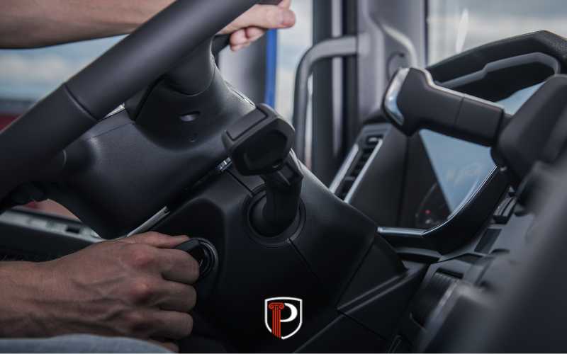 a commercial driver putting a key in the ignition of a vehicle