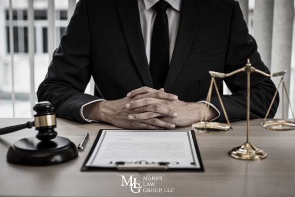 an attorney at a desk for a deposition