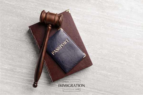 a passport and gavel on a table