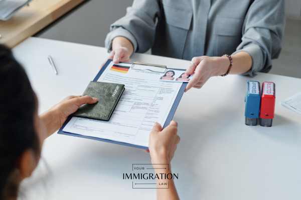 a woman being interviewed for a U visa