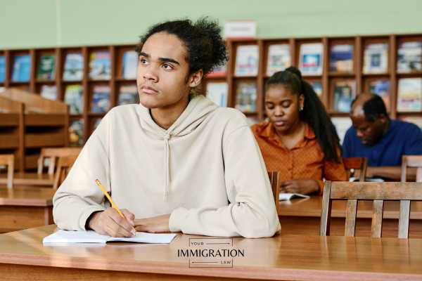 a young man on a j-1 visa in a college class