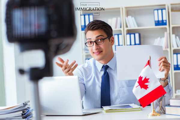 a Canadian man interviewing for a TN visa job over web cam