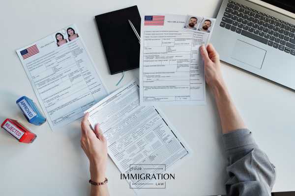 a USCIS official looking over an EB5 visa application