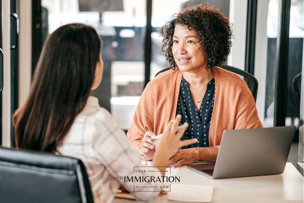 a woman with a permanent work visa in a job interview