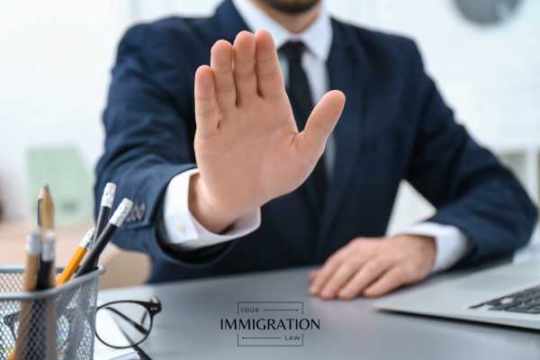 an immigration officer denying a permanent work visa application