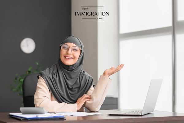a woman working in an administrative role at a mosque