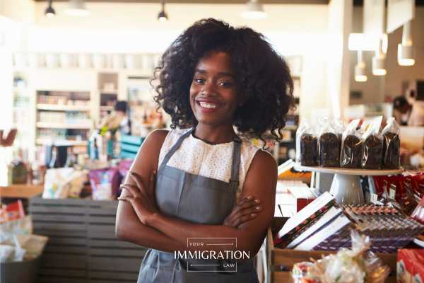 a woman with asylum status at work